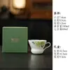 Taza de té de cerámica pintada a mano bajo vidriado de peonía y mariposa con asa, taza de maestro, juego de té kung fu para uso doméstico