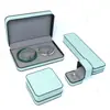 Caja de joyería de cuero PU con borde negro y esquinas redondeadas, adecuada para pulseras, collares y brazaletes; una caja de regalo universal para ventas transfronterizas