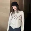 Primavera 2026 Nuevo Estilo Juvenil Suéter Tejido de Punto con Trenzas Huecas Acolchado para Mujer Casual Diseño Simple Top Tejido