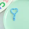 Llaveros de corazón pintados de colores estilo Ins, accesorios para manualidades, dijes de colores de caramelo para bolsos y mochilas, venta al por mayor
