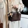 Colección de otoño 2026 transfronteriza: bolsa tote retro de gran capacidad, bolso de hombro moderno y versátil, bolso de hombro y bolso cruzado estilo coreano