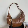 Bolso de Axila de Textura Popular Versátil Retro de Nicho para Mujer Verano 2025 Bolso de Hombro Cruzado Casual Simple