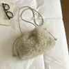 Bolsa Nueva de Mujer Otoño 2026 Bolso Cubo Moderno y Único Bolso de Hombro de Felpa Bolso Esponjoso de Color Sólido de Alto Valor