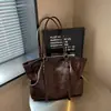 Elegante bolso vintage para mujer 2026 nuevo modelo, bolsa de mano versátil para el día a día, bolso de hombro casual y sencillo, bolso cruzado para el antebrazo
