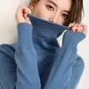 Venta al por mayor del fabricante Suéter de punto de cuello alto para otoño e invierno para mujer Cuello de pelo Suéter versátil Suéter ajustado para llevar debajo