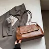 Bolsa Feminina de Grande Capacidade para Axila 2025 Novo Estilo Texturizada Minimalista Francesa Bolsa de Mão Corrente Moda Bolsa de Ombro Atacado