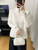Estilo Coreano Simple para el Trabajo Otoño/Invierno 2026 Nuevo Cuello Alto Botones Tejido Base Suelto Suéter Jersey Mujer Tendencia