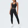Conjunto de outfit de yoga ajustado con diseño deportivo en la espalda, de tela cepillada con bloques de color transfronterizos, sensación nude, pantalones largos de cintura alta para levantar glúteos para correr y fitness