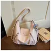 Bolsa de mano transfronteriza de gran capacidad para mujer, mochila de moda 2026 para ir al trabajo, bolso de hombro versátil de alta gama