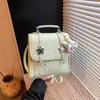 Mochila de lunares de nicho estilo coreano para mujer 2026 Nueva moda moderna Bolso de mano Mini mochila escolar casual para el día a día