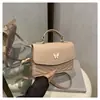 Bolsa Pequena Quadrada Casual Nova Estilo Coreano Cor Sólida Elegante Simples com Laço 2025 Bolsa de Mão Fresca Ombro Transversal para Mulheres