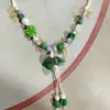Collar con colgante de campana de mariposa de cerámica de estilo étnico retro para mujer, diseño nuevo y moderno, cadena larga para suéter, accesorios
