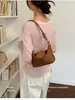 Comercio exterior transfronterizo: Bolso de mano pequeño vintage para mujer, bolso de gamuza de moda nuevo de la fábrica original