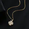 Colgante de collar de trébol de cuatro hojas transfronterizo, estilo dulce y simple, joyería elegante tipo princesa socialité con forma giratoria, venta directa del fabricante