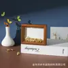 Nuevo marco de fotos de vidrio hueco tridimensional estilo chino, marco vacío con un toque de alta gama, exhibición de mesa, decoración de marco de fotos de madera al por mayor del fabricante