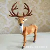 Animal de simulación ciervo sika simulación alce jirafa modelo animal de piel accesorios de decoración para cine y televisión venta al por mayor