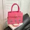Primavera 2026 Moda Vintage Nueva Colorido Divertido Bloque de Color Personalidad Versátil Bolso de Hombro Cruzado Pequeño Casa Bolso Kelly
