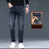 Jeans Masculino de Cintura Alta Tendência Marca de Luxo Corte Reto Solto Primavera/Outono 2026 Novo Versátil Elástico Casual Calça Longa