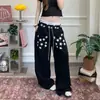 Pantalones de chándal retro americanos con estampado de letras y estrellas, pierna curva, unisex, nueva colección primavera/otoño 2026, corte holgado, versátiles pantalones negros de pierna ancha
