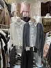 Cardigan de punto trenzado de dos piezas falsas de estilo nuevo para otoño temprano 2026 para mujer, abrigo suéter elegante de cuello polo estilo coreano