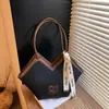 Bolso de Hombro Cruzado con Bloques de Color Estampado de Leopardo para Mujer 2026 Nuevo Diseño de Nicho Bolso Tote Versátil para Viajar al Trabajo