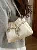 Bolsa de corrente com padrão de losangos para mulheres, novo design moderno e sofisticado de 2026, adequada para o dia a dia, bolsa de ombro, bolsa de axila, bolsa tipo balde fashion, bolsa transversal