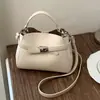 Bolso de mano de alta gama para mujer 2026 nuevo de primavera-verano moderno súper popular para el trabajo y los desplazamientos bandolera cruzada tipo cubo