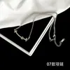 [56] logotipo de comercio exterior sin marca acero de titanio joyería Europa y Estados Unidos variedad de hip-hop apilado collar de clavícula de acero de titanio