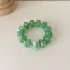 Pulsera elástica de cuentas planas estilo vintage europeo y americano para mujer, pulsera de resina superventas transfronteriza, joyas y accesorios para la mano
