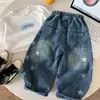 Pantalones vaqueros para niño Kino, ropa infantil de otoño, pantalones casuales versátiles, pantalones con estampado de estrellas estilo coreano, elegantes pantalones de pierna curva para bebés