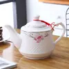 Tetera de Cerámica Olla Individual Gran Capacidad Hogareña Hueso de China 1-2 Litros Olla para Preparar Té Resistente a Altas Temperaturas con Filtro Jarra para Agua Fría Venta al Por Mayor