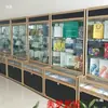 Gabinete de Exhibición para Computadoras de Aleación de Titanio Vitrina Mostrador de Cristal Estante