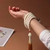 Som de chocalho quente com raiz de Bodhi de Jade Branco de Hainan branco puro para homens e mulheres em volta do dedo pulseira de mão macia vendas diretas da fábrica