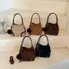 Bolsa de Ombro/Axila Estilo Balde Transfronteiriço Japonês e Coreano Exquisita Outono 2026 Nova Versátil Grande Capacidade Nicho para o Dia a Dia