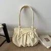 Bolso de mano fresco y delicado de lunares con un lazo, nuevo diseño de moda nicho para mujer 2026, bolso de hombro para ir al trabajo, bolso de axila