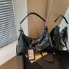 Bolso de axila de diseño de nicho versátil de moda transfronterizo, bolso cruzado de gran capacidad de alta gama, bolso tipo dumpling con bloques de color para commuters
