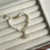 Artículo Popular Transfronterizo: Collar de Perlas Saturno, Collar de Suéter Doble Capa de Alto Nivel para Mujer en Capas, Cadena de Cuello Fina de Lujo Ligero con Pin