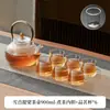 Tetera de vidrio de borosilicato alto a prueba de explosiones a alta temperatura patrón martillado transparente cafetera casera asa de cobre asa asa viga olla juego de té al por mayor