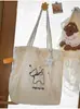 Bolso de Lona con Estampado de Dibujos Animados Nuevo Bolso de Estudio para Chicas Artísticas Gran Capacidad Bolso de Lona de un Solo Hombro Bolso Cruzado con Cordón