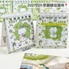 Lindo gato trébol de cuatro hojas 2027 mini calendario de escritorio, alto atractivo estético, estilo femenino, mini calendario para estudiantes, decoración de escritorio