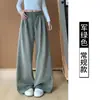 Pantalones anchos de lunares negros estilo coreano para mujer, adecuados para primavera y otoño, con caída fluida, cintura con cordón, tiro alto y un estilo relajado y casual con estampado floral