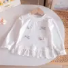 Chegadas da Primavera de 2026 Blusa com Renda para Meninas Estilo Princesa Laço 3D Desenho Doce Camada Base Tendência