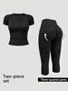 2026 Nuevo Conjunto de Yoga Sin Costuras de Lunares Europeo y Americano con Almohadillas en el Pecho, Cuello Halter, Espalda Hermosa, Shorts Levanta Glúteos, Conjunto de Dos Piezas para Fitness
