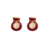 Pendientes de la fortuna festivos de Año Nuevo rojos de estilo chino, pendientes de traje elegantes retro de moda nacional, pendientes de borlas huecas