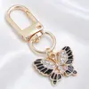 Llavero de Mariposa de Esmalte Blanco y Negro de Gama Alta, Colgante Completo de Diamante, Mariposa Combinada con Colgante de Oro, Llavero DIY, Colgante Pequeño
