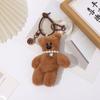 Cabeza torcida linda oso de frijol con sonido oso de peluche llavero colgante estudiante mochila escolar decoración para mochila de hombre y mujer