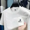 Nueva Camiseta de Verano para Hombre Cuello Redondo Manga Corta Holgada Jacquard Bordado Exquisito Simple Moda Casual Camiseta de Manga Corta para Hombre