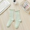 Calcetines de otoño de algodón para mujer desodorantes a la moda combinables color caramelo transpirables antibacterianos de media caña ins a la moda tipo calcetín apilado