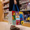 Bolsa de lona de grande capacidade, bolsa de tecido não tecido, bolsa tote de desenho animado fofa personalizada para o dia a dia, ecológica, versátil, alto valor estético