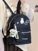 Mochila clásica estilo universitario de lunares con conejito, color salmón fresco y discreto, para niñas, adecuada para estudiantes de secundaria y preparatoria, versátil para ir al campus.